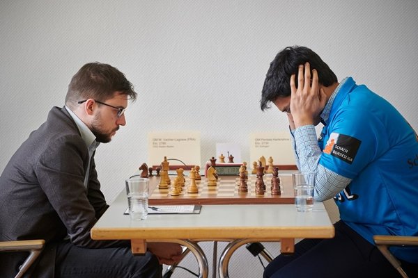 Maxime on the verge of playing 23.Qb3+! (photo : Guido Giotta).